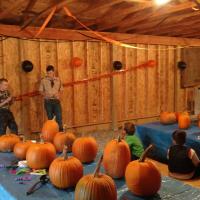 Corbin and Patrick demonstrating knife safety to the Cub Scouts